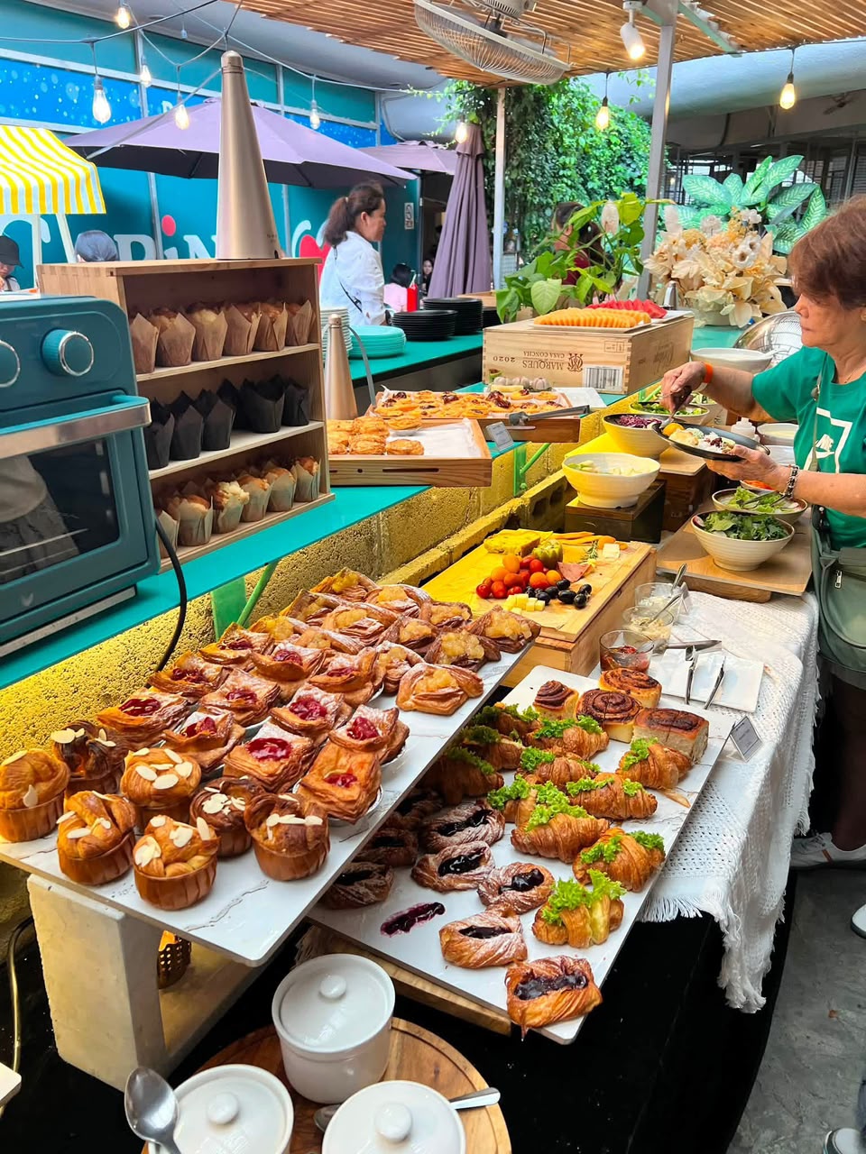 Pastries and salads on the buffet table